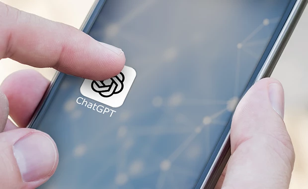 A person is about to tap the ChatGPT app icon on a smartphone screen.