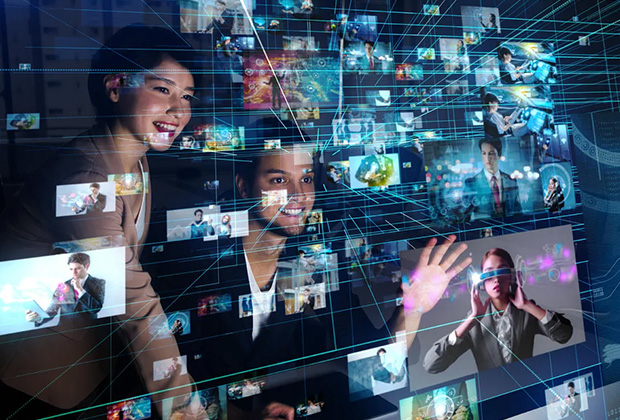 Two people interact with a digital interface surrounded by floating images and data streams.