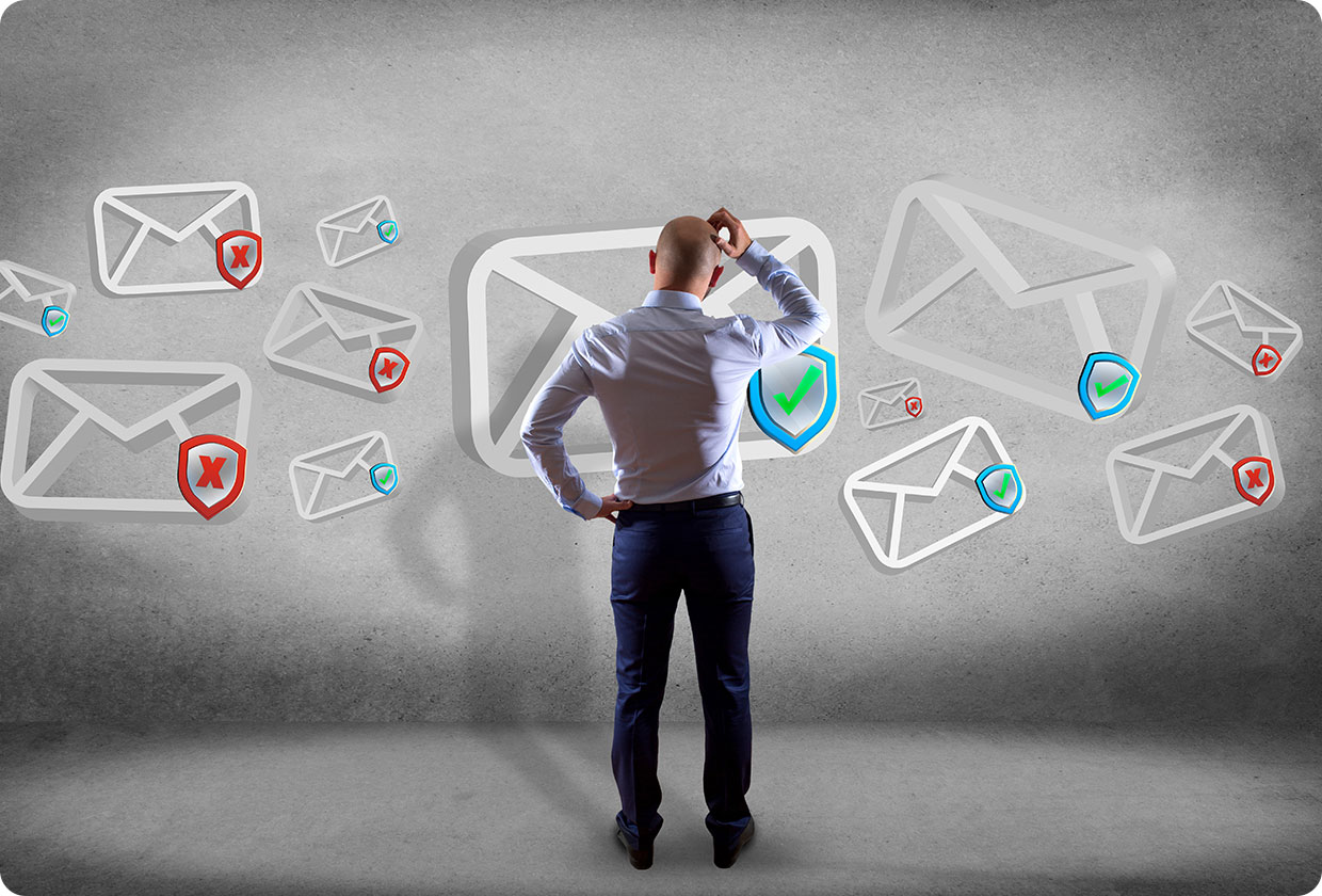 A man stands scratching his head while looking at floating email icons marked with check and cross symbols.